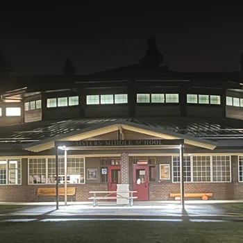 Photograph of Sisters Middle School's Entrance at Night